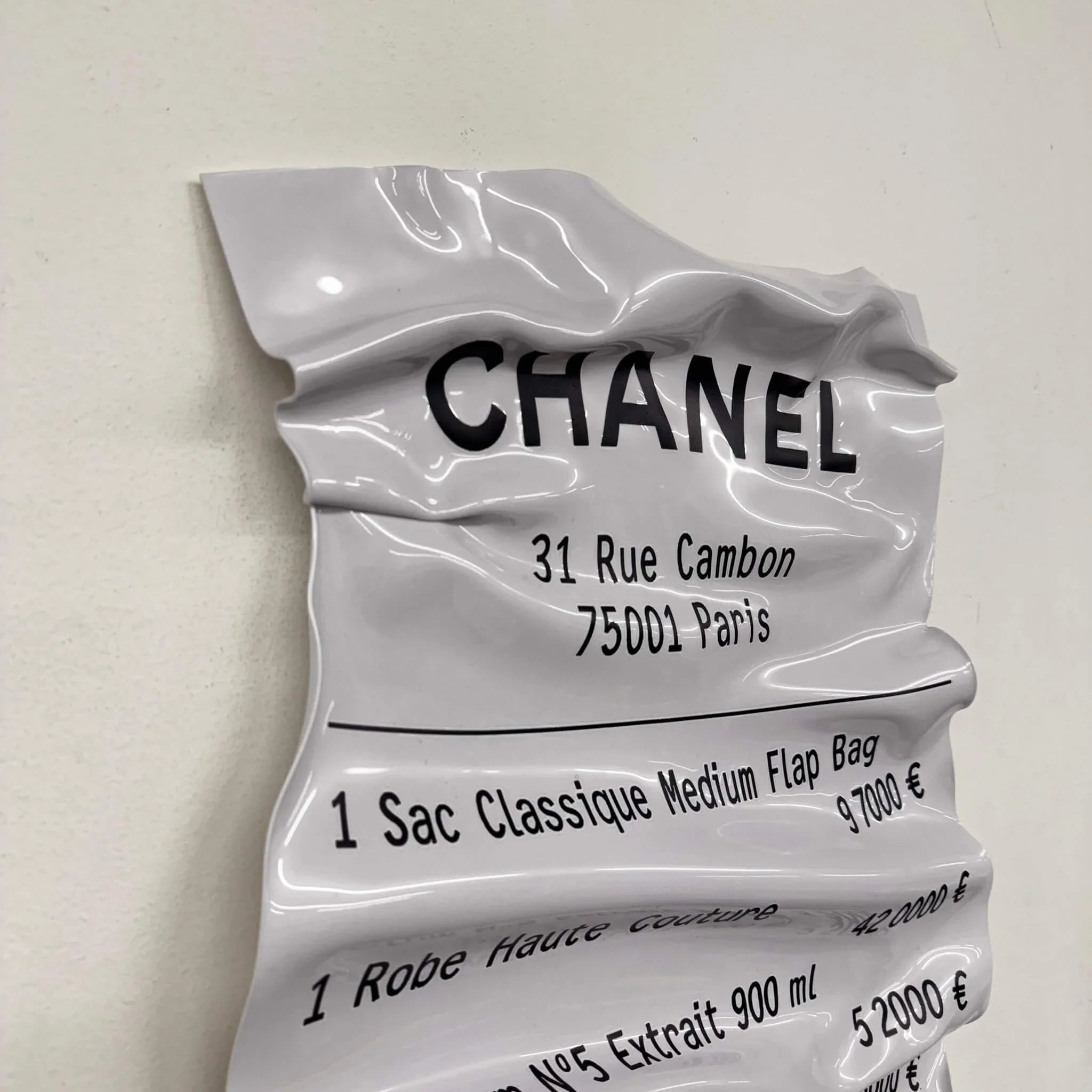 Zerknittertes Tableau - Ticket "Chanel"