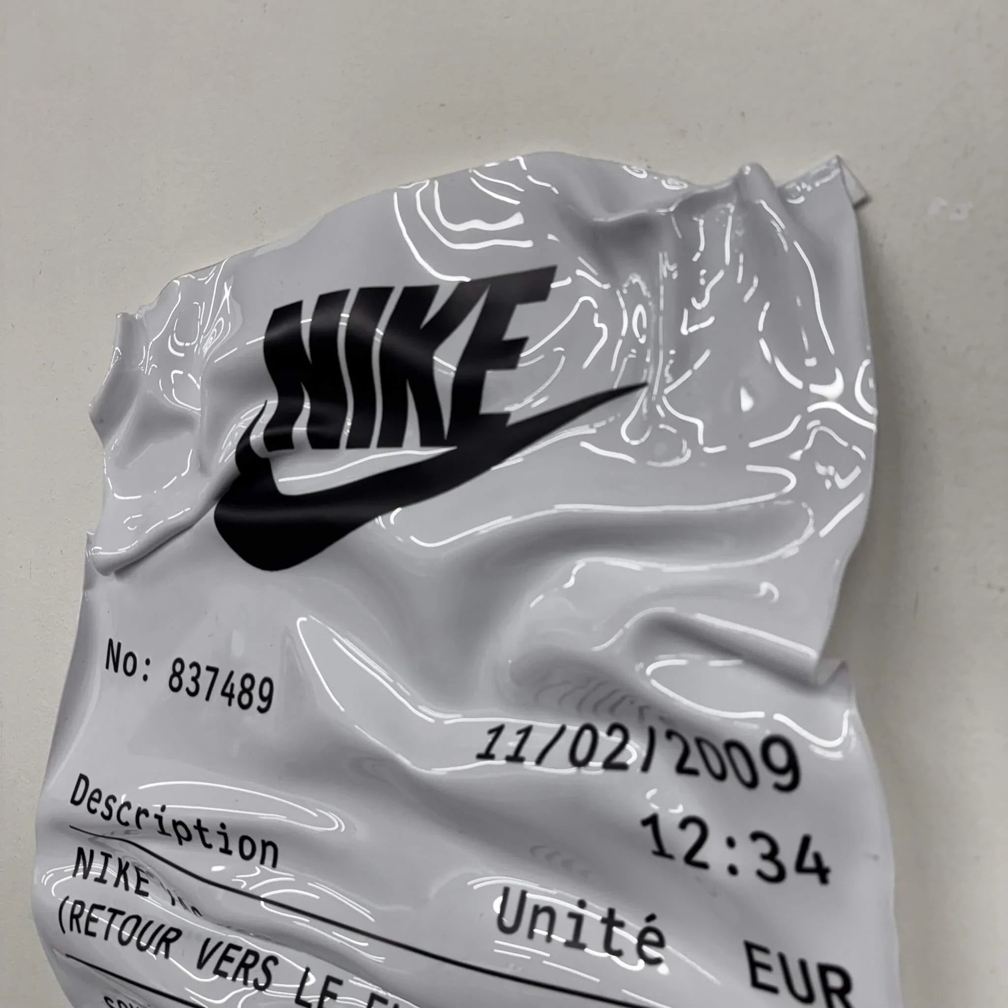 Tabla arrugada – Entrada Nike Mag