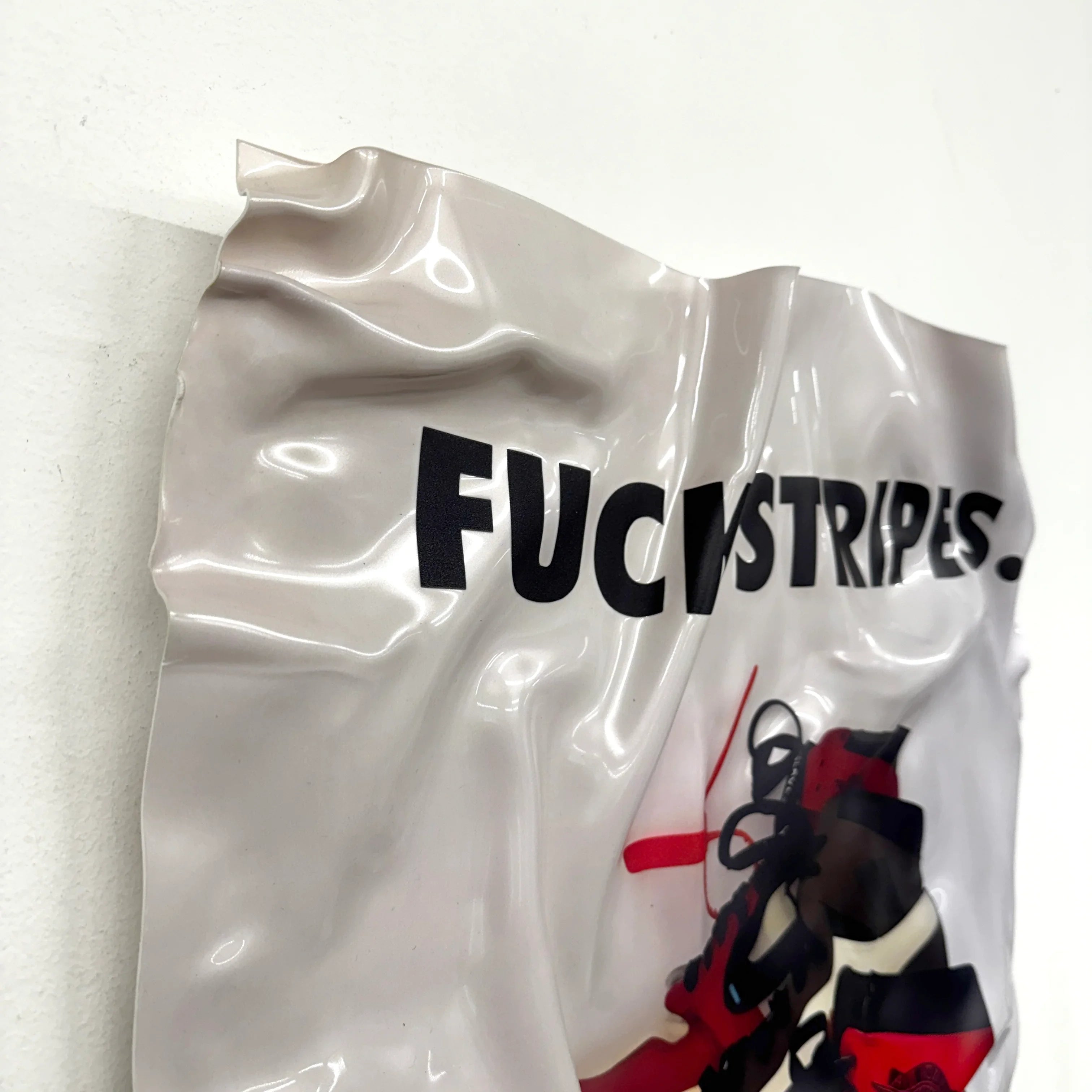 Crumpled Table – Nike "Fuck Stripes"